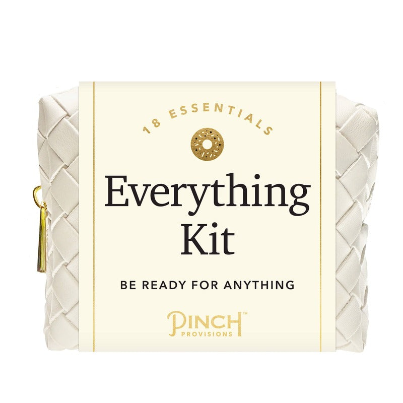 PINCH PROVISIONS Woven Everything Kit in cream with gold accents and tassel detail