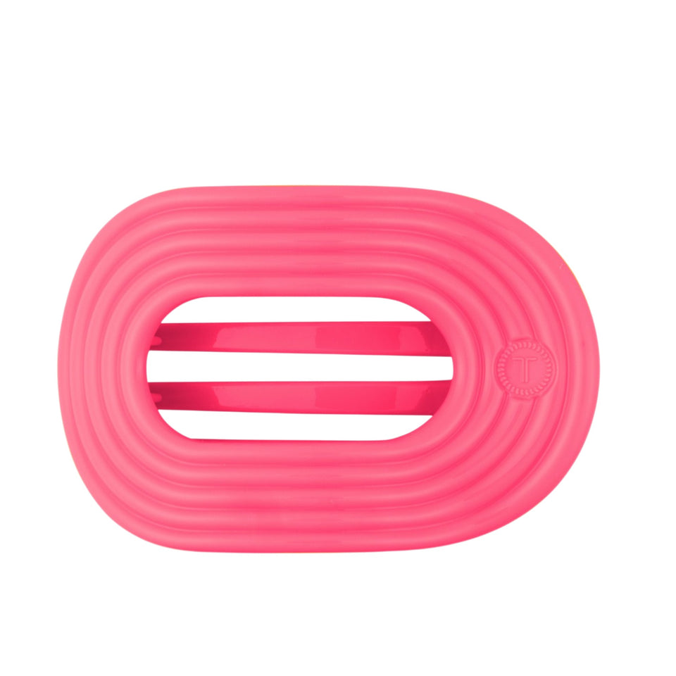 TELETIES Flat Round Tropic Twist Large hair tie in bright pink on black background