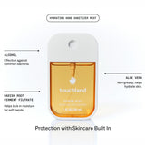 Touchland hand sanitizer mist with labeled ingredients: alcohol, aloe vera, and radish root ferment filtrate.