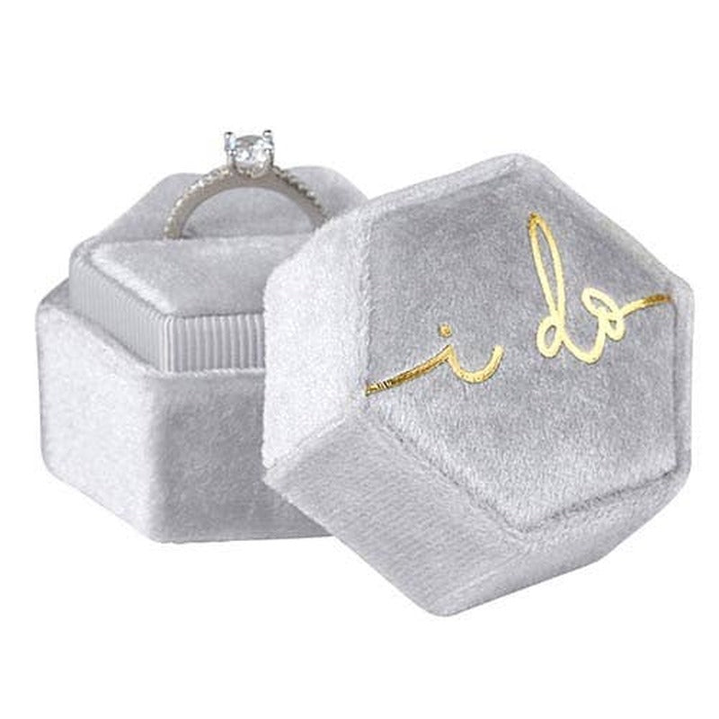 Gray velvet ring box with gold 'I Do' text, displaying diamond engagement ring