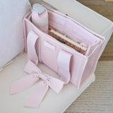 Ballet pink tote organizer insert displayed with contents including water bottle and accessories