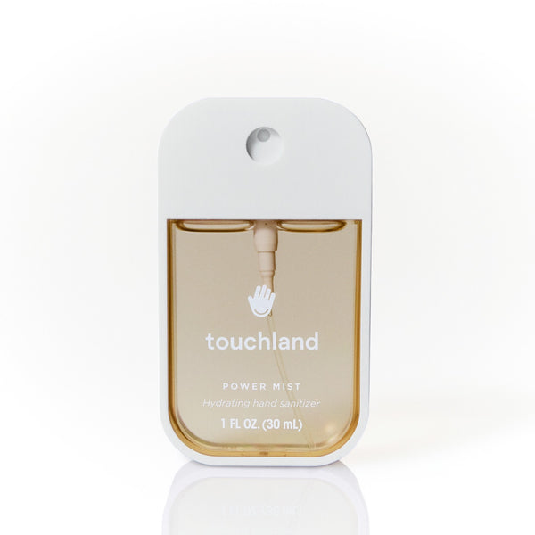 Touchland Power Mist hydrating hand sanitizer in 1 fl oz bottle with white cap on neutral background