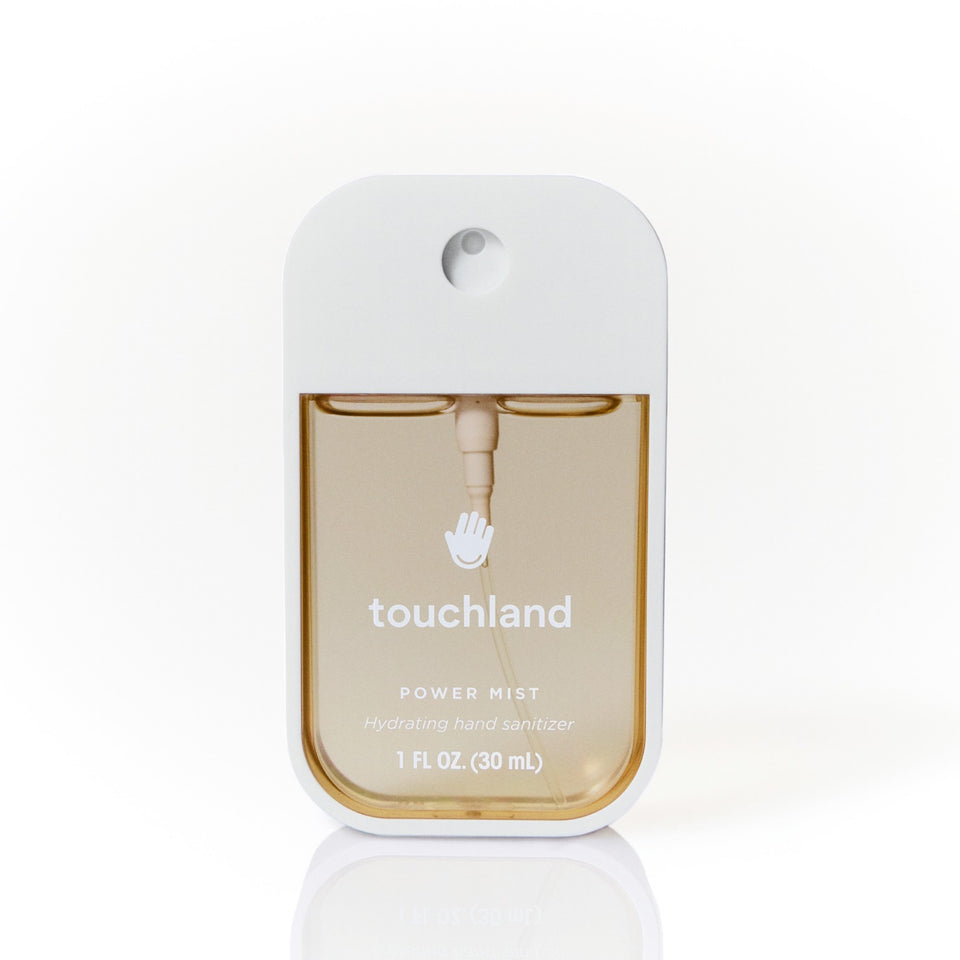 Touchland Power Mist hydrating hand sanitizer in 1 fl oz bottle with white cap on neutral background