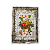 Rifle Paper Co. Harvest Tea Towel with colorful fruit basket and botanical border design