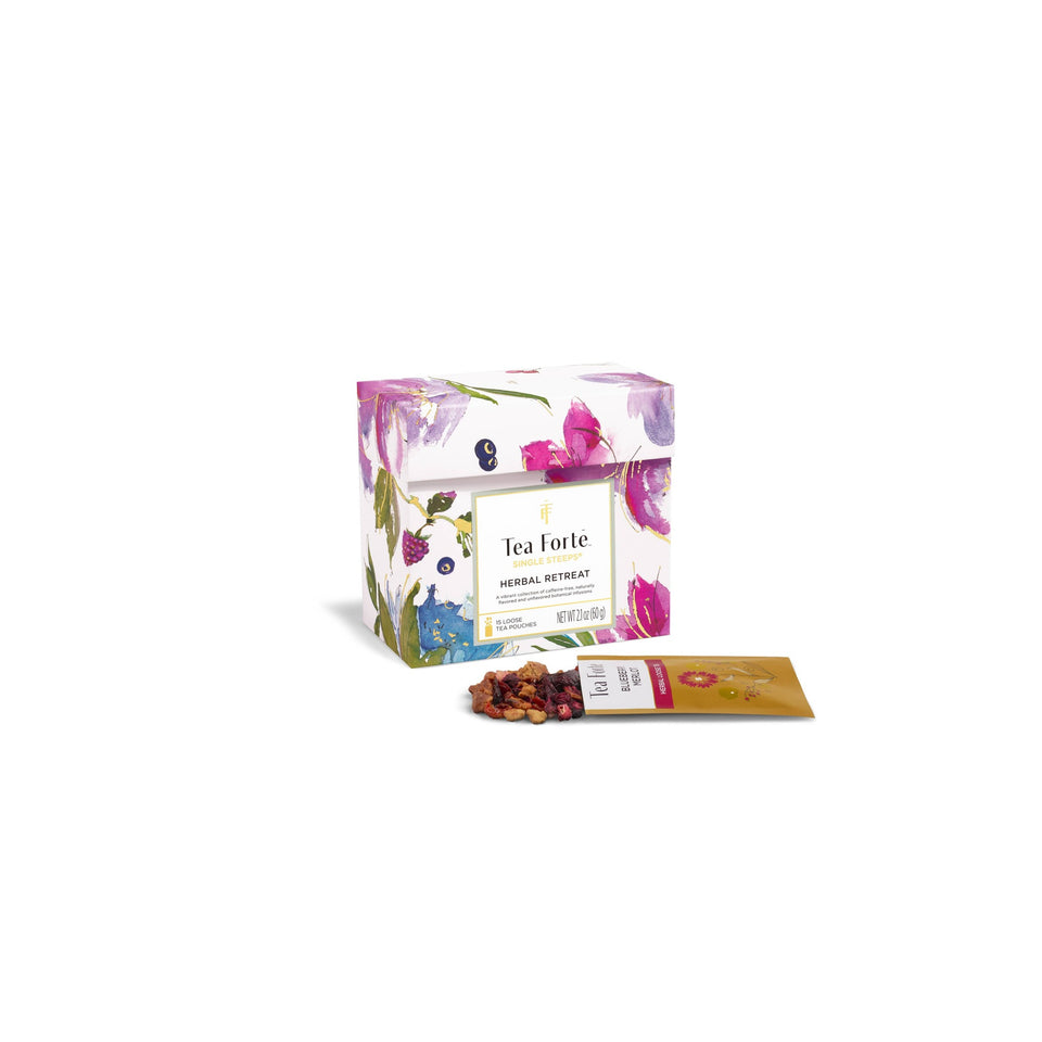 Tea Forte Herbal Retreat loose tea pouches box with sample packet displayed on white background