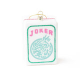 White glass ornament with 'JOKER' text and turquoise mahjong tile design, gold loop hanger