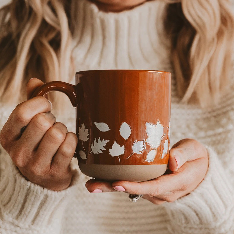 sweet-water-decor-fall-leaves-mug-lifestyle-in-hands