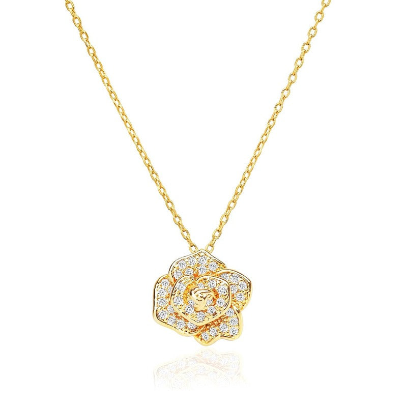 Gold pave rose pendant necklace with cubic zirconia crystals on chain