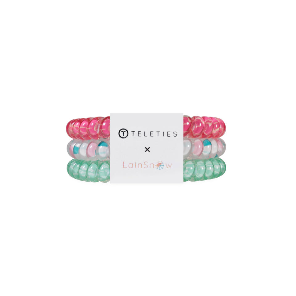 TELETIES x LainSnow small hair ties in pink, white, and green colors displayed together