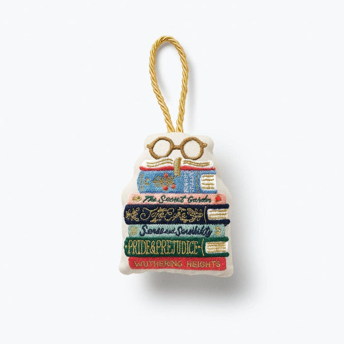 Rifle Paper Co. Book Club Embroidered Ornament with colorful stacked books and glasses on white background