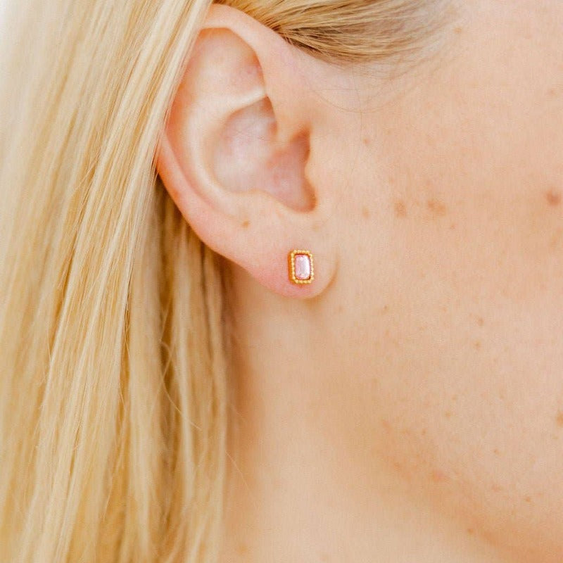 Madison Pink screwback stud earrings worn on model with blonde hair, showing product styling