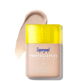 Supergoop! Protec(Tint) Daily SPF Tint with yellow cap on a white background