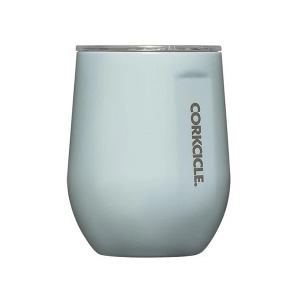 A light blue-gray insulated stemless wine tumbler with a clear lid and the CORKCILE brand name printed vertically on the side, shown against a plain white background.