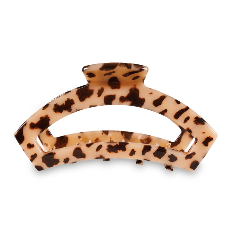TELETIES Large Open Hair Clip in Blonde Tortoise with dark brown spots on white background