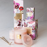 Glasshouse Fragrances candle and packaging on a light background