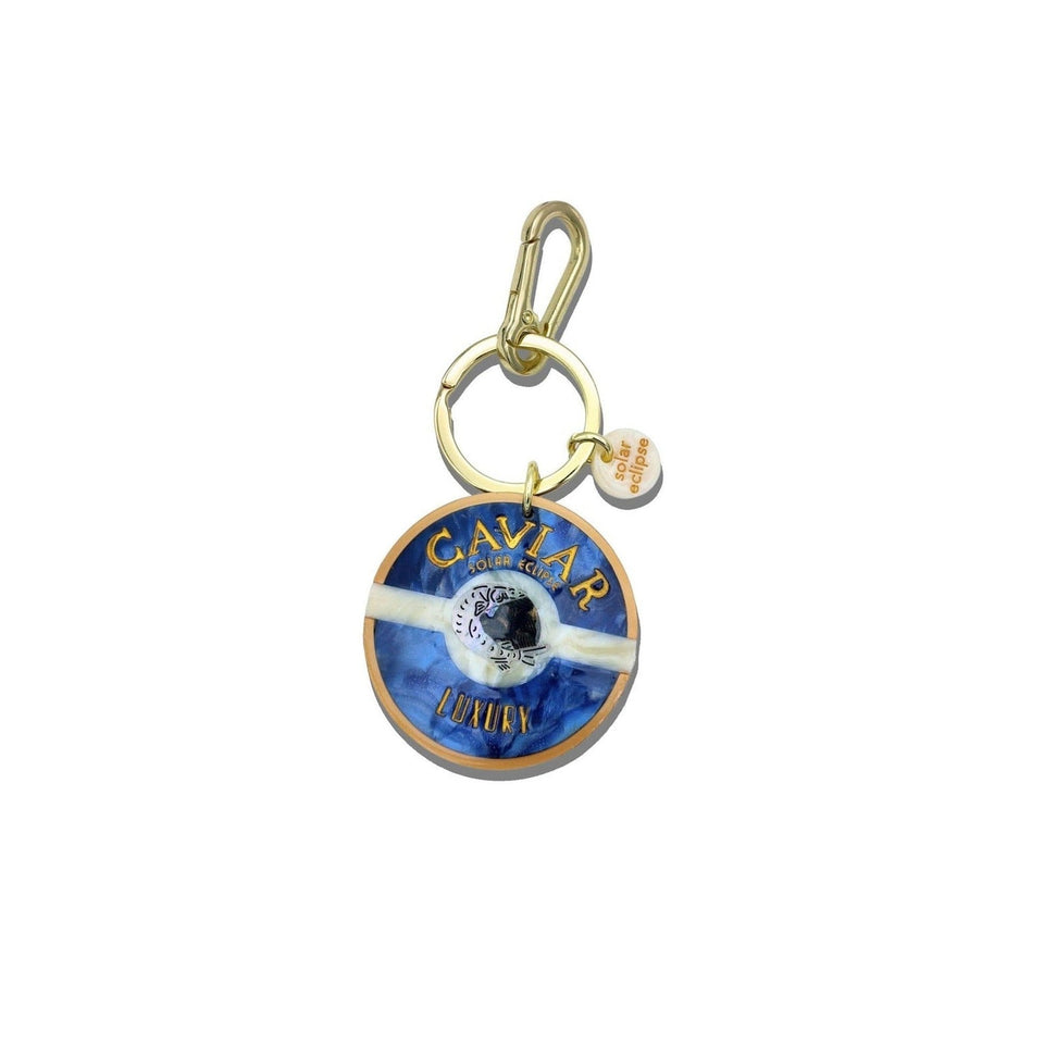 Solar Eclipse hand-painted caviar bag charm keychain with blue enamel design and gold-tone hardware