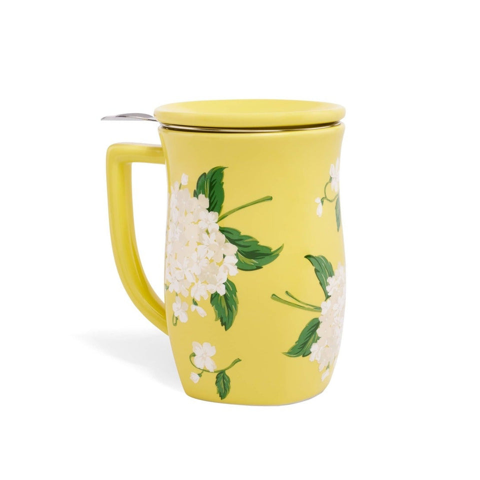 Yellow Hydrangea Fiore steeping cup with white floral design and metal infuser lid