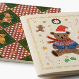 Two Rifle Paper Co. Beary Christmas pocket notebooks with festive bear and holiday designs