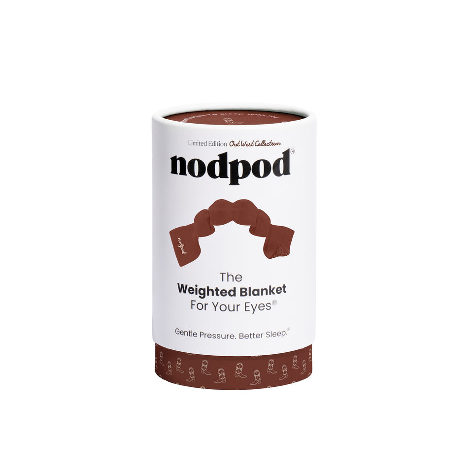 Nodpod Saddle Up weighted sleep mask in brown packaging against white background