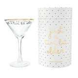 Gold foil martini glass with 'Just a Tini Bit Older' text and polka dot gift box packaging