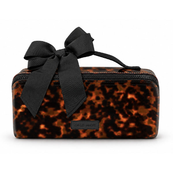 Case-Mate tortoiseshell jelly cosmetic bag with black ribbon bow on white background