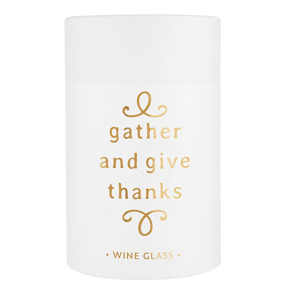 White stemless wine glass with gold 'Gather and Give Thanks' text and decorative flourishes