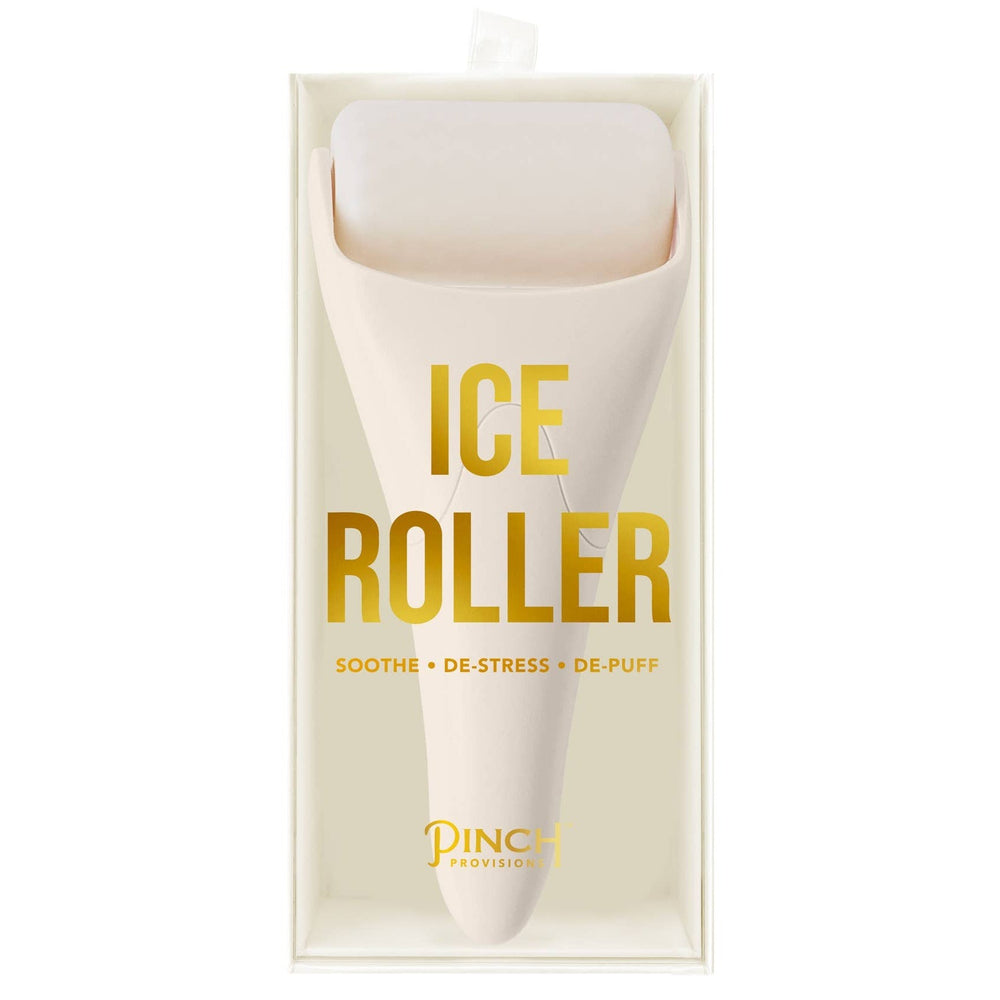 Pinch Provisions ivory ice roller in packaging with gold text on white background