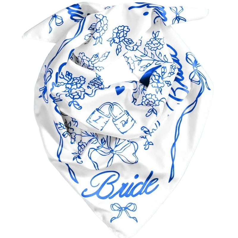 White silk bride hair scarf with blue floral and bow design, wedding accessory