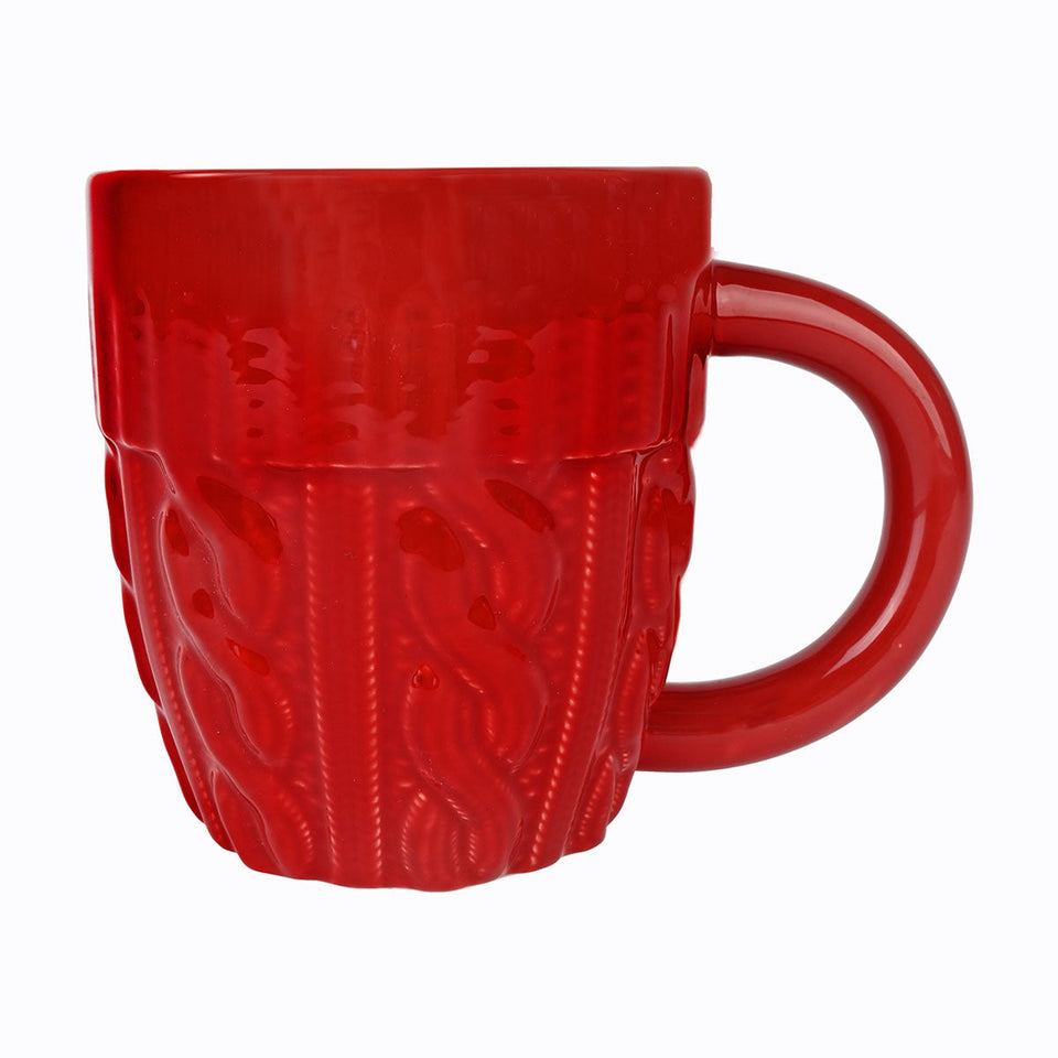 Red sweater coffee mug with textured knit pattern design on white background