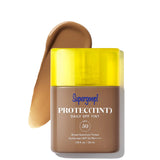 Supergoop! Protec(Tint) Daily SPF Tint with yellow cap on a white background