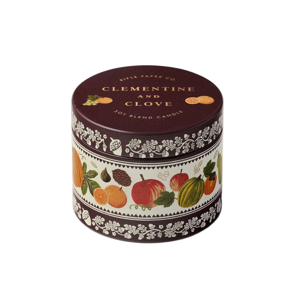 Rifle Paper Co. Clementine and Clove 3 oz soy blend candle in decorative tin with fruit and floral design