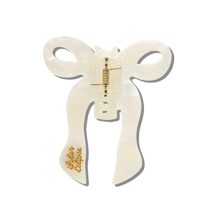 Solar Eclipse hand-painted coquette bow claw hair clip in cream with gold hardware, eco-friendly