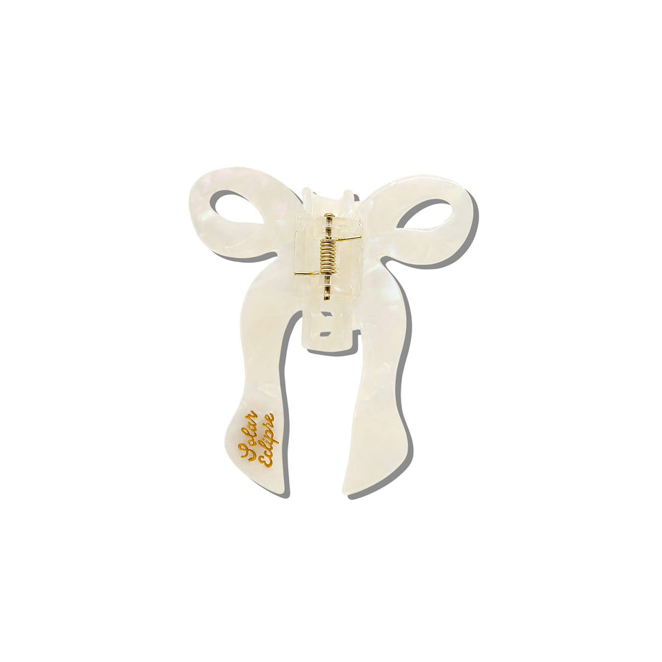 Solar Eclipse hand-painted coquette bow claw hair clip in cream with gold hardware, eco-friendly