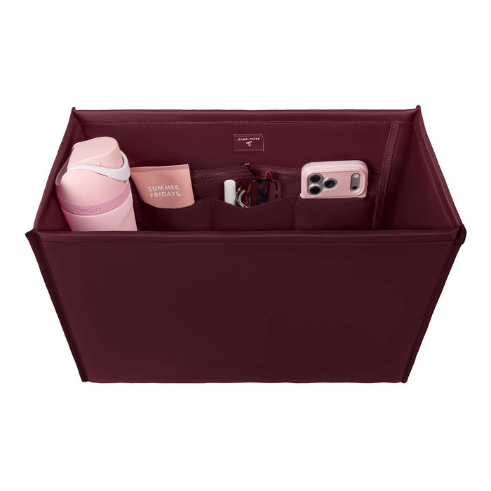 Mulberry Case-Mate tote organizer with compartments holding pink accessories and phone case
