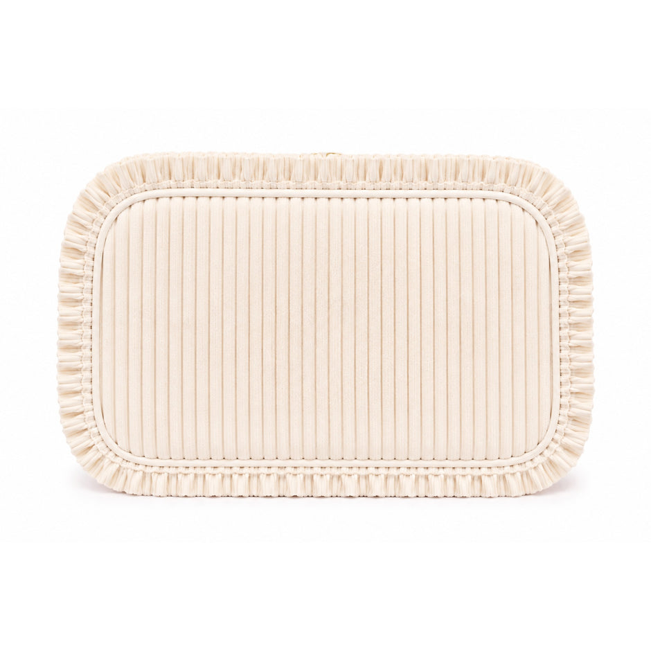 Cream woven rectangular bedrotting kit with pleated fabric texture and fringe trim