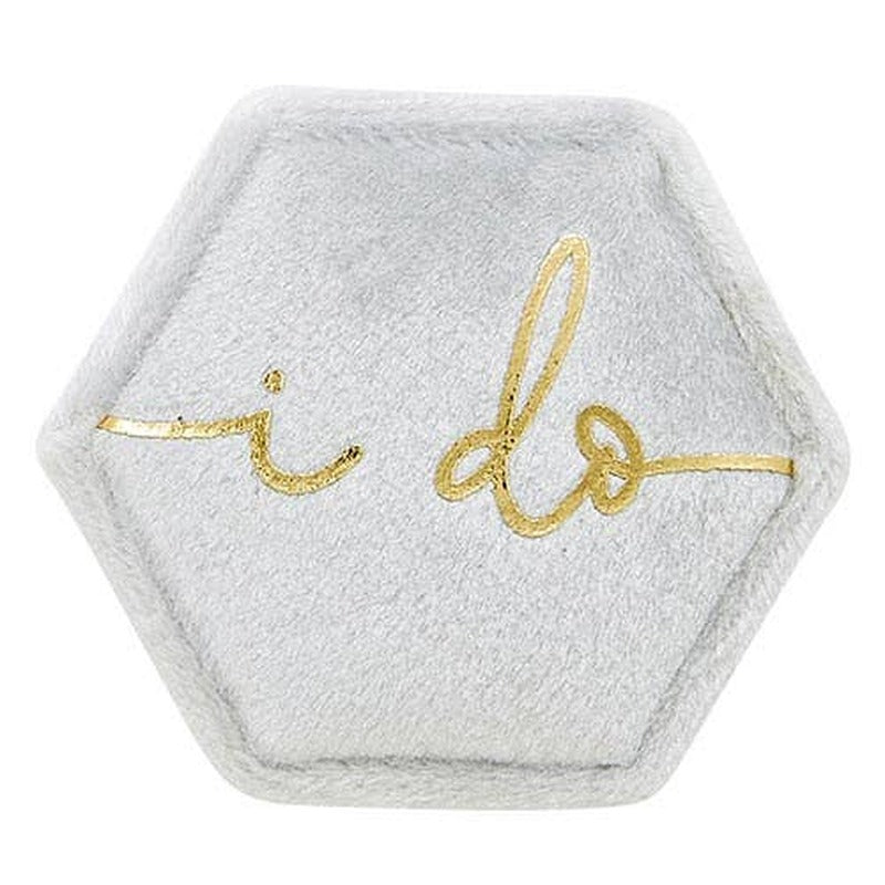 Velvet hexagonal ring box with 'I do' gold embroidery on light gray felt