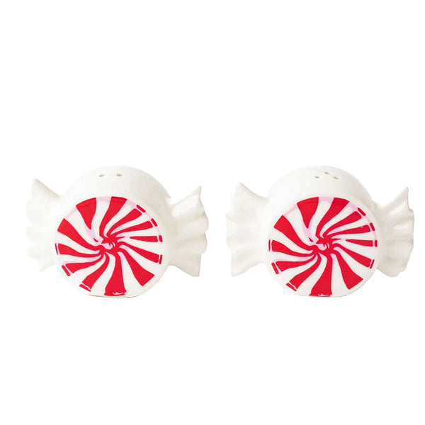 Two white ceramic fish-shaped salt and pepper shakers with red and white peppermint swirl design