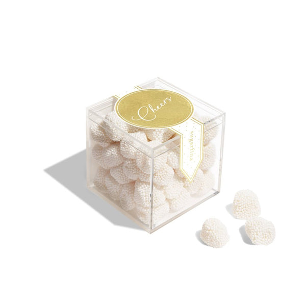 Sugarfina Cheers Champagne Bubbles in clear cube box with gold label, white background