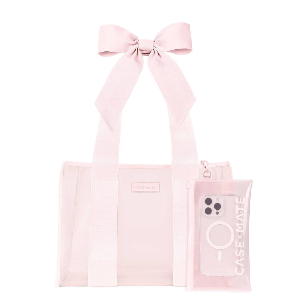 Ballet pink tote bag with bow handles and matching phone case on white background
