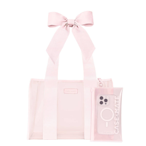 Ballet pink tote bag with bow handles and matching phone case on white background