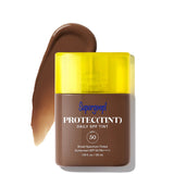 Supergoop! Protec(Tint) Daily SPF Tint with yellow cap on a white background