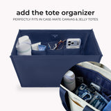 Denim tote organizer displaying compartments filled with accessories and everyday items