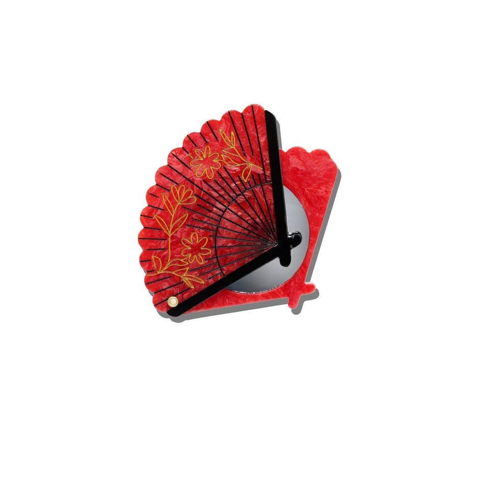 Red hand-painted vintage fan compact mirror with golden floral design and black handle