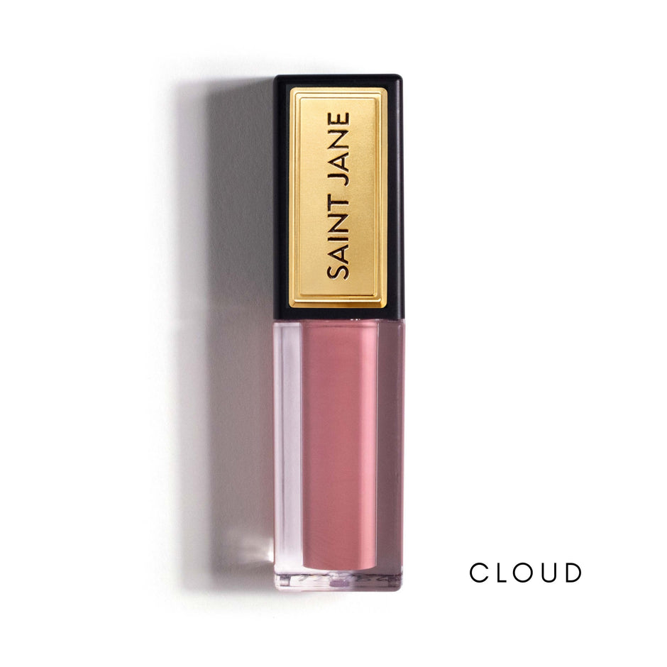 Saint Jane Lip Shine in Cloud - pink liquid lipstick with gold cap on white background