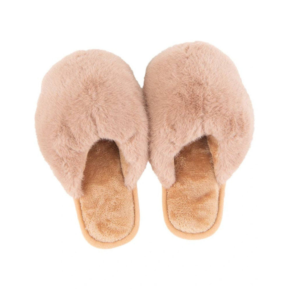 Tan faux fur jumbo slippers with soft plush exterior and comfortable sole on white background