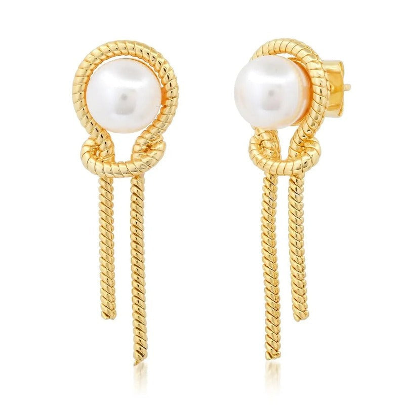 Gold knotted chain pearl drop earrings with white pearl studs on white background