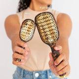 TELETIES Mini and Full Size Vented Brush comparison in tortoise pattern held by model