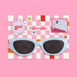 Blue bride sunglasses with 'Yeti' and 'Bride Sunglasses' text overlays on checkered background