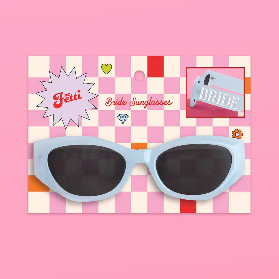 Blue bride sunglasses with 'Yeti' and 'Bride Sunglasses' text overlays on checkered background