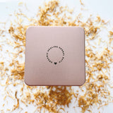 Organic Herbal Sitz Bath box by Mother Mother on white background with dried herbs